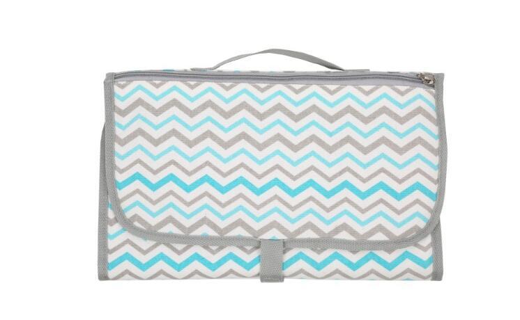 Make diaper changes hassle-free anywhere with this Baby Portable Foldable Travel Nappy Changing Mat. Waterproof, compact, and washable, it’s perfect for on-the-go use and comes with a convenient storage bag.