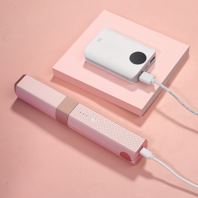 Style your hair anywhere with this Cordless USB Hair Straightener. Mini ceramic design, portable, and perfect for straightening or curling on the go.