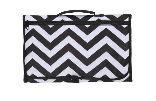 Make diaper changes hassle-free anywhere with this Baby Portable Foldable Travel Nappy Changing Mat. Waterproof, compact, and washable, it’s perfect for on-the-go use and comes with a convenient storage bag.