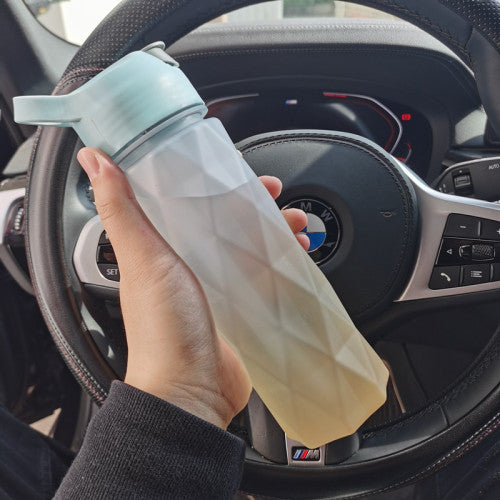 Stay refreshed on the go with this Large Capacity Spray Water Bottle. Lightweight, portable, and perfect for sports, fitness, travel, or outdoor activities.