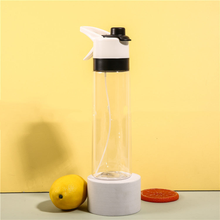 Stay refreshed on the go with this Large Capacity Spray Water Bottle. Lightweight, portable, and perfect for sports, fitness, travel, or outdoor activities.
