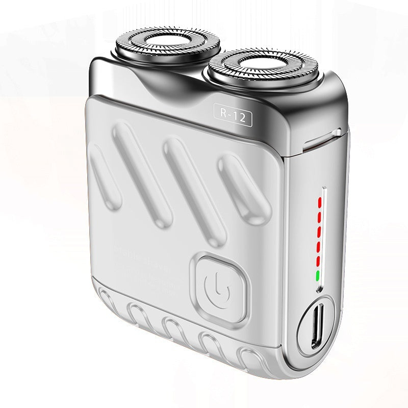 Stay groomed on the go with this Portable Dual-Ring Electric Shaver for Men. Compact, rechargeable, and featuring a double floating magnetic blade head—perfect for travel and daily use.