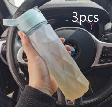 Stay refreshed on the go with this Large Capacity Spray Water Bottle. Lightweight, portable, and perfect for sports, fitness, travel, or outdoor activities.