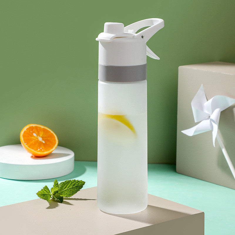 Stay refreshed on the go with this Large Capacity Spray Water Bottle. Lightweight, portable, and perfect for sports, fitness, travel, or outdoor activities.